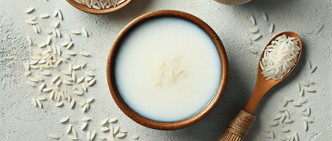 Rice extract and rice water, a traditional Korean skincare ingredient known for its brightening, hydrating, and soothing properties, commonly used in beauty products to promote a radiant complexion.