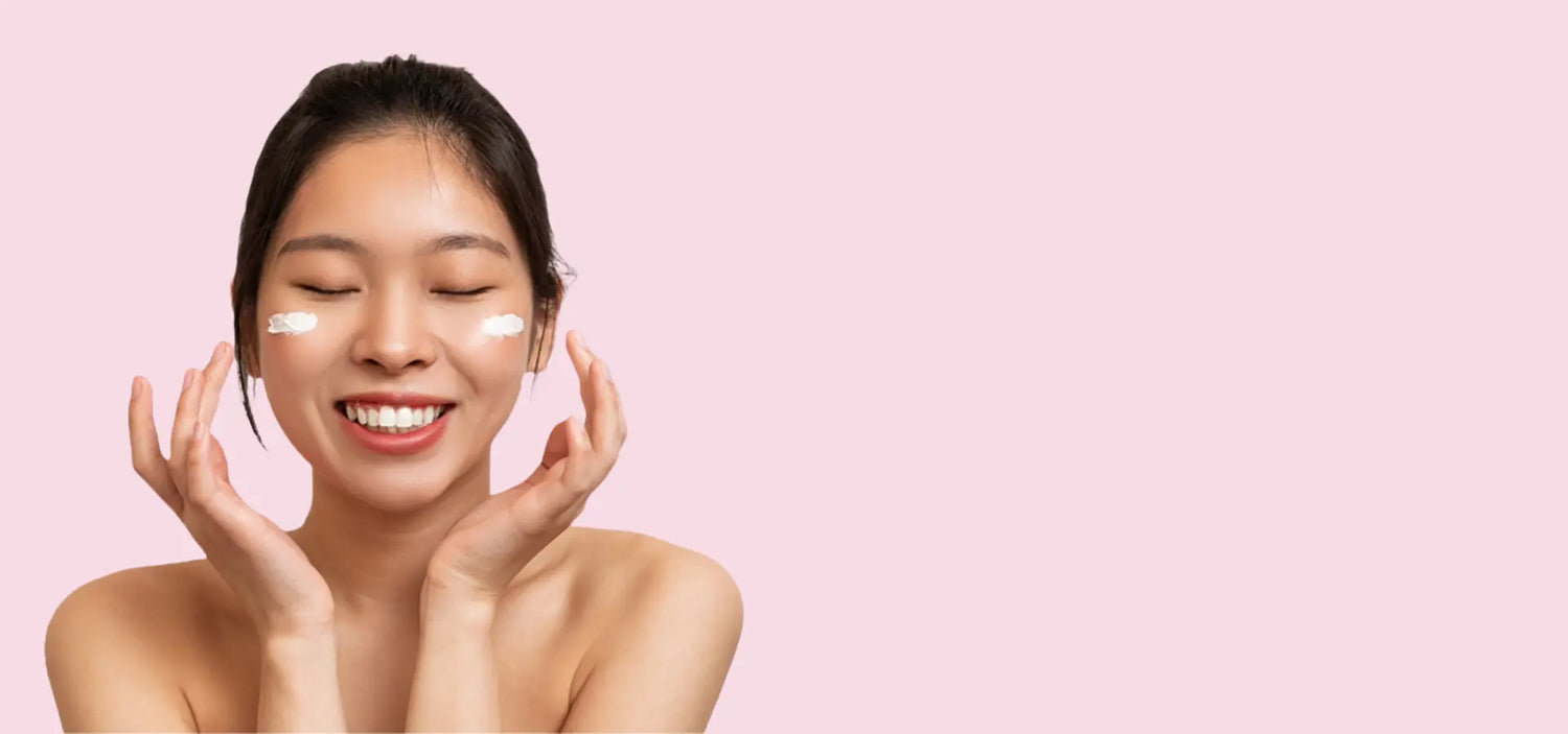 A model applying a hydrating Korean beauty moisturizer with a radiant smile. Showcasing the perfect glow, hydration, and nourishment for healthy skin.