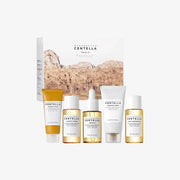 SKIN1004 Madagascar Centella Travel Kit – A complete mini skincare set featuring the Ampoule Foam, Toning Toner, Centella Ampoule, Soothing Cream, and Light Cleansing Oil. Perfect for travel and sensitive skin, infused with pure Centella from Madagascar for hydration and skin barrier support.