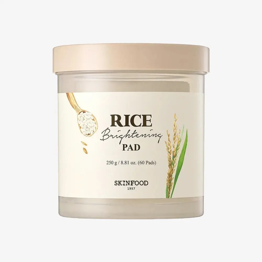 Skinfood Rice Brightening Pads – Exfoliating and hydrating Korean skincare pads infused with rice extract for a radiant complexion. Available at Ferozia.